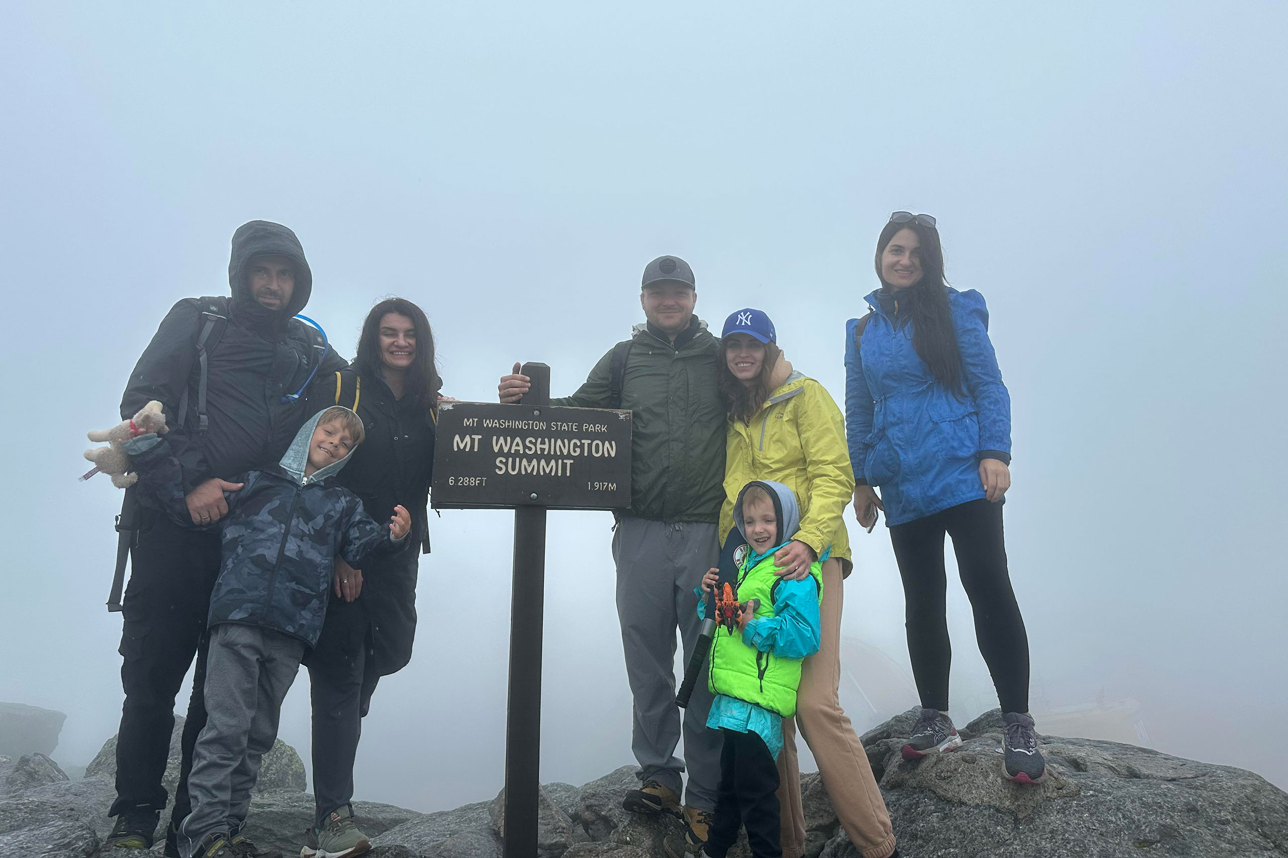 Hikers atop Mount Washington summit