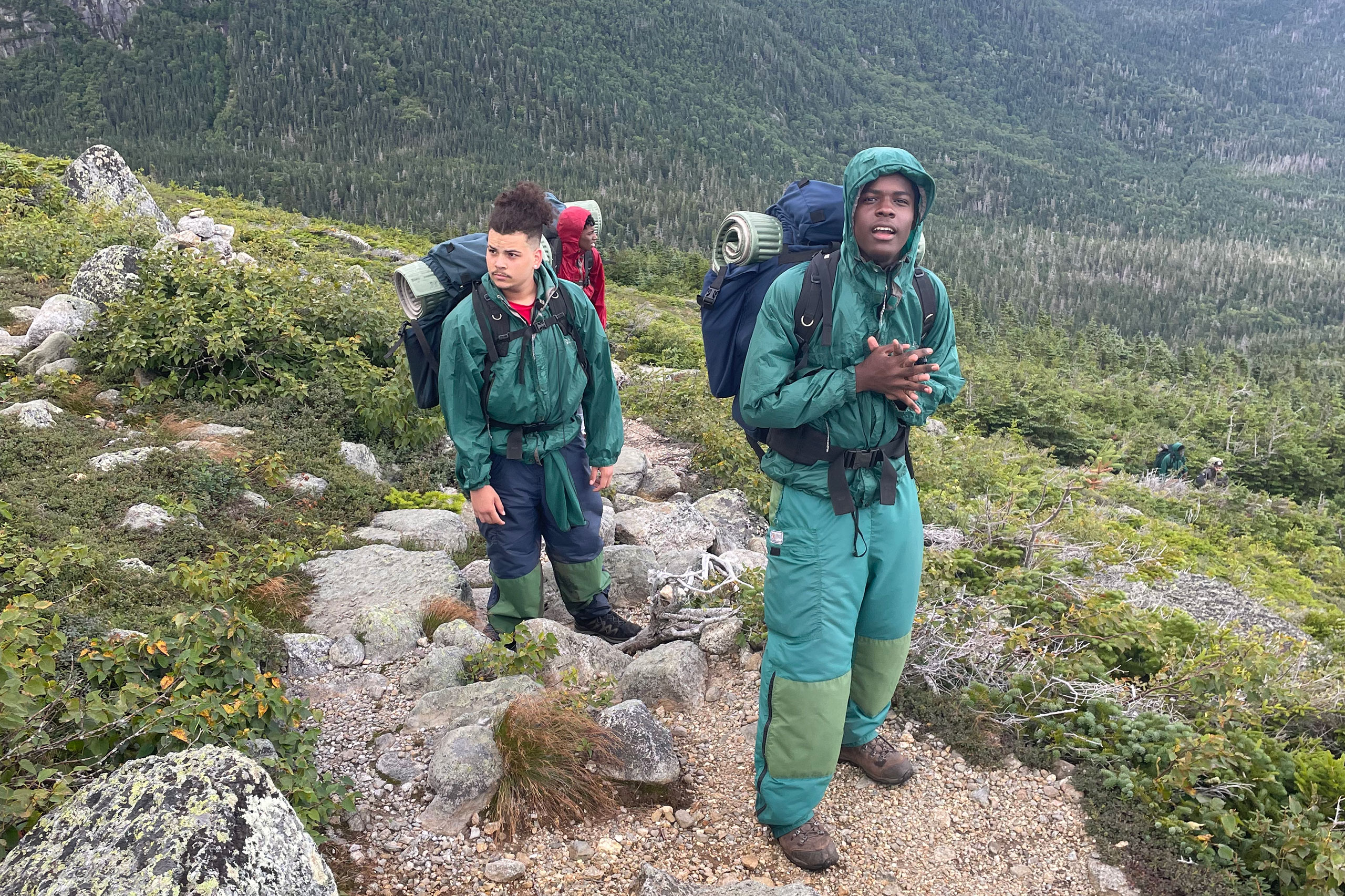Young hikers on mountain trail